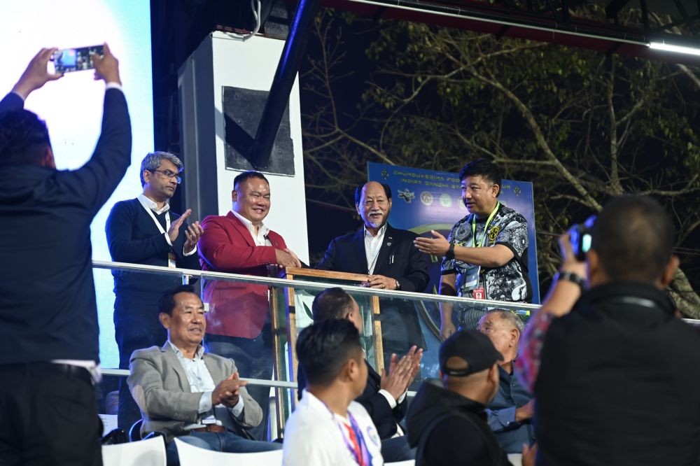 Paralympic medalist and Arjuna Awardee Hokato Hotozhe Sema from Nagaland donates the jersey he wore to win the historic bronze medal in the Men’s Shot Put F57 Final at the Paralympic Games Paris 2024 to Nagaland Olympic Association President Neiphiu Rio at Chümoukedima Football Stadium on January 28. (Morung Photo)